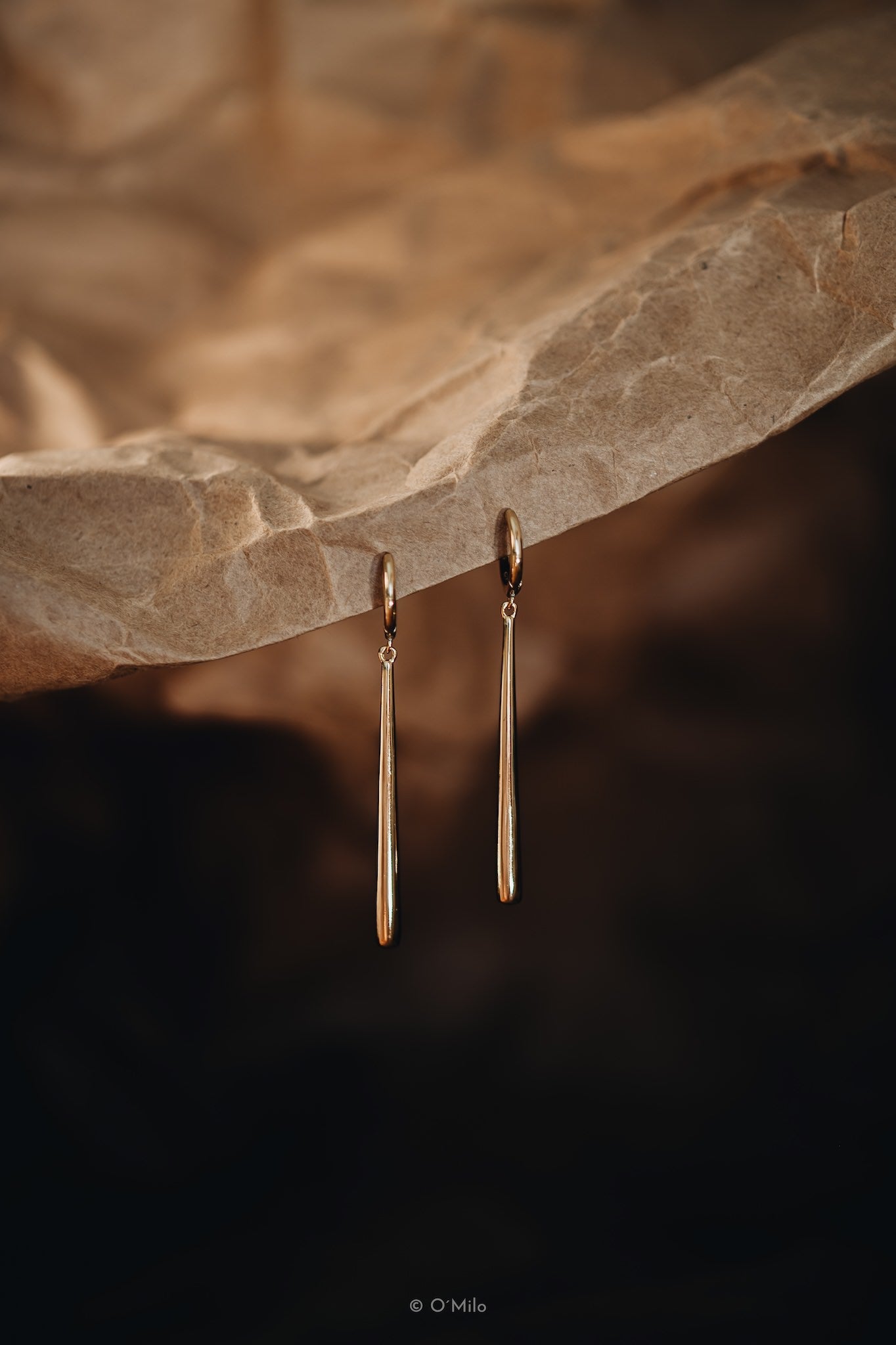 Golden Pendulum Earrings. Vela