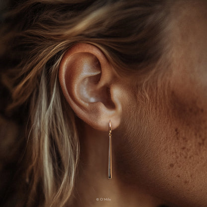 Golden Pendulum Earrings. Vela